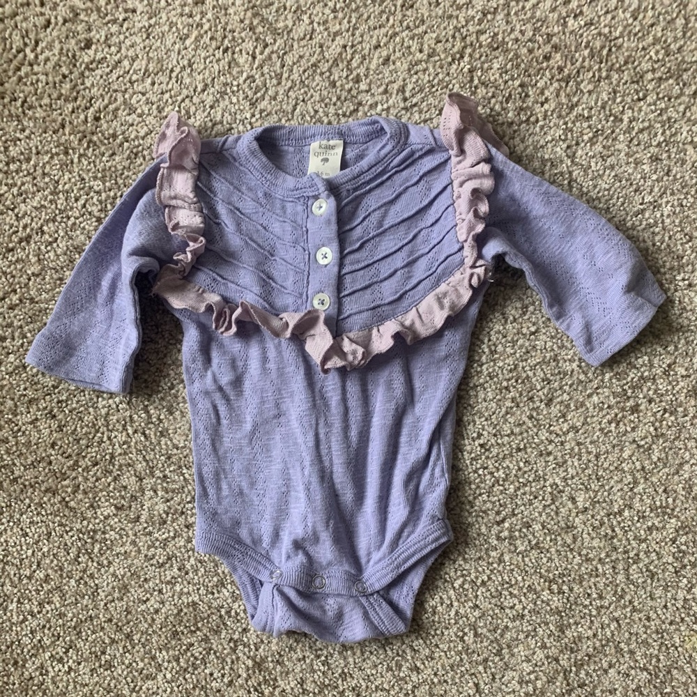 Kate Quinn long sleeve ruffle bodysuit